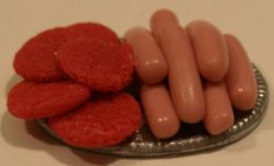 Raw Hamburgers & Hot Dogs by Carolyn McVicker