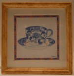 Tea Cup #A Framed Print by McBay