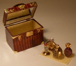Brown Lizard Train Case by Jose Gomez