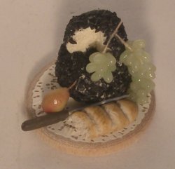 Tomme au Raison French Cheese by Linda Cummings