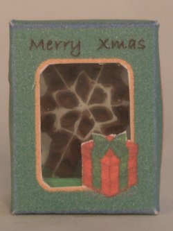 Chocolate Snowflake in Green Christmas Box by Linda Cummings