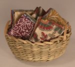 Folded Fabric in Basket by Shepherds