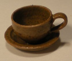 Cup and Saucer Brown by Elisabeth Causeret