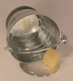 Bucket of Spilled Water & Sponge by Shepherds