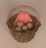 Eggs in Basket by Evelyne Andriamasy