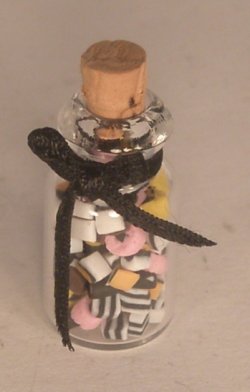 Glass Jar of Licorice by Linda Cummings