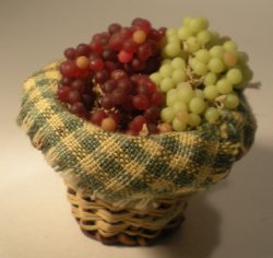 Grape Display in Basket by Richard Johnson