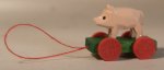 Small Wood Animal on Wheel Toy Pig by Matthias Matthes