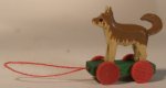 Small Wood Animal on Wheel Toy Dog by Matthias Matthes