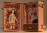 Doll in Pink Leather Trunk #89 by Almudene Ferrandez