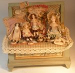 Dolls in Toy Chest by Almudene Ferrandez