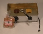 Hamburger on Grill by Carolyn Eiche