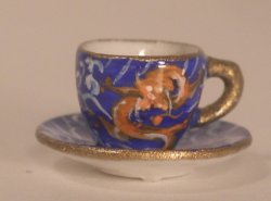 Dragon Cup & Saucer by Christopher Whitford