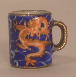 Dragon Coffee Cup by Christopher Whitford
