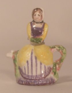 Lady in Yellow Dress Teapot by Valerie Casson