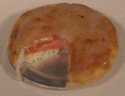 Pizza w/Piece Missing by Richard Johnson