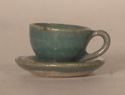 Cup and Saucer Green by Elisabeth Causeret