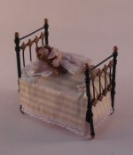 Doll in Bed #2 by Almudene Ferrandez