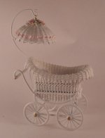 White Wicker Baby Carriage by Wilhelmina