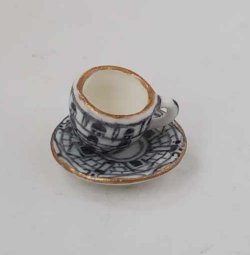 Fornasetti Cup & Saucer by Christopher Whitford