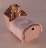 Teddy Bear in Crib Pink by Gilles Roche