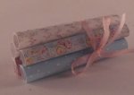 Rolls of Paper Tied w/Ribbon by Montserrat Folch