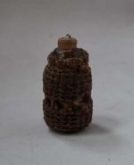 Glass Bottle in a Woven Basket #K