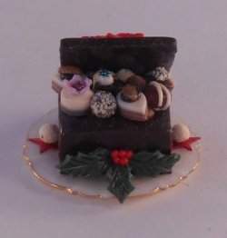 Chocolates in Poinsettia Box by Linda Cummings