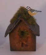 Bird on Birdhouse by Country Treasures