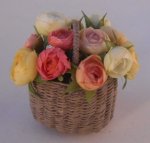 Pastel Roses in Brown Basket by Gosia Suchodolska