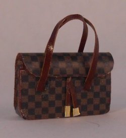Monogram Tassel Purse by Jose Gomez