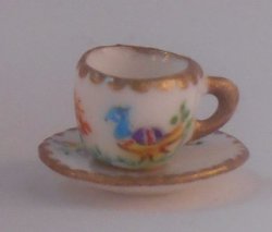 Exotic Bird Cup & Saucer by Christopher Whitford