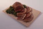 Roast Beef on Cutting Board by Gosia Suchodolska